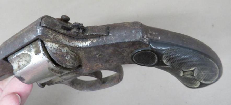 Two Antique Revolvers