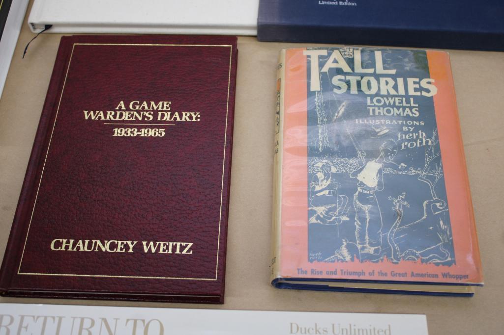 Collection of Hardcover Books Including Tall Stories by Lowell Thomas and Ducks Unlimited