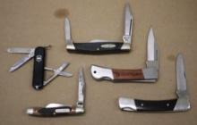 Five Small Folding Knives by Schrade Old Timer, Carhartt, Buck, and Victorinox