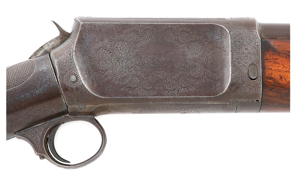 Engraved Burgess Deluxe Slide Action Shotgun