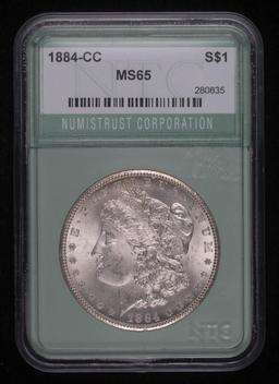 1884 CC MORGAN SILVER DOLLAR COIN NTC MS65