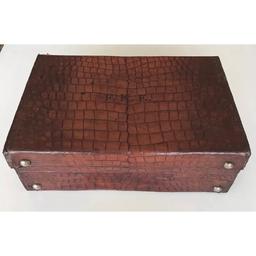 **Regretfully Withdrawn**Brown crocodile skin suitcase