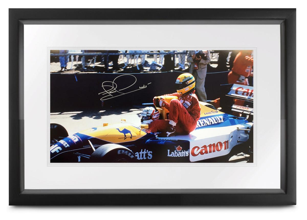 To the pits â€˜Taxi for Sennaâ€™ signed Nigel Mansell CBE