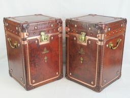 A fine pair of leather and copper Army and Navy style trunks