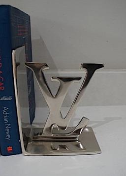 A pair of Louis Vuitton inspired book ends