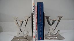 A pair of Louis Vuitton inspired book ends