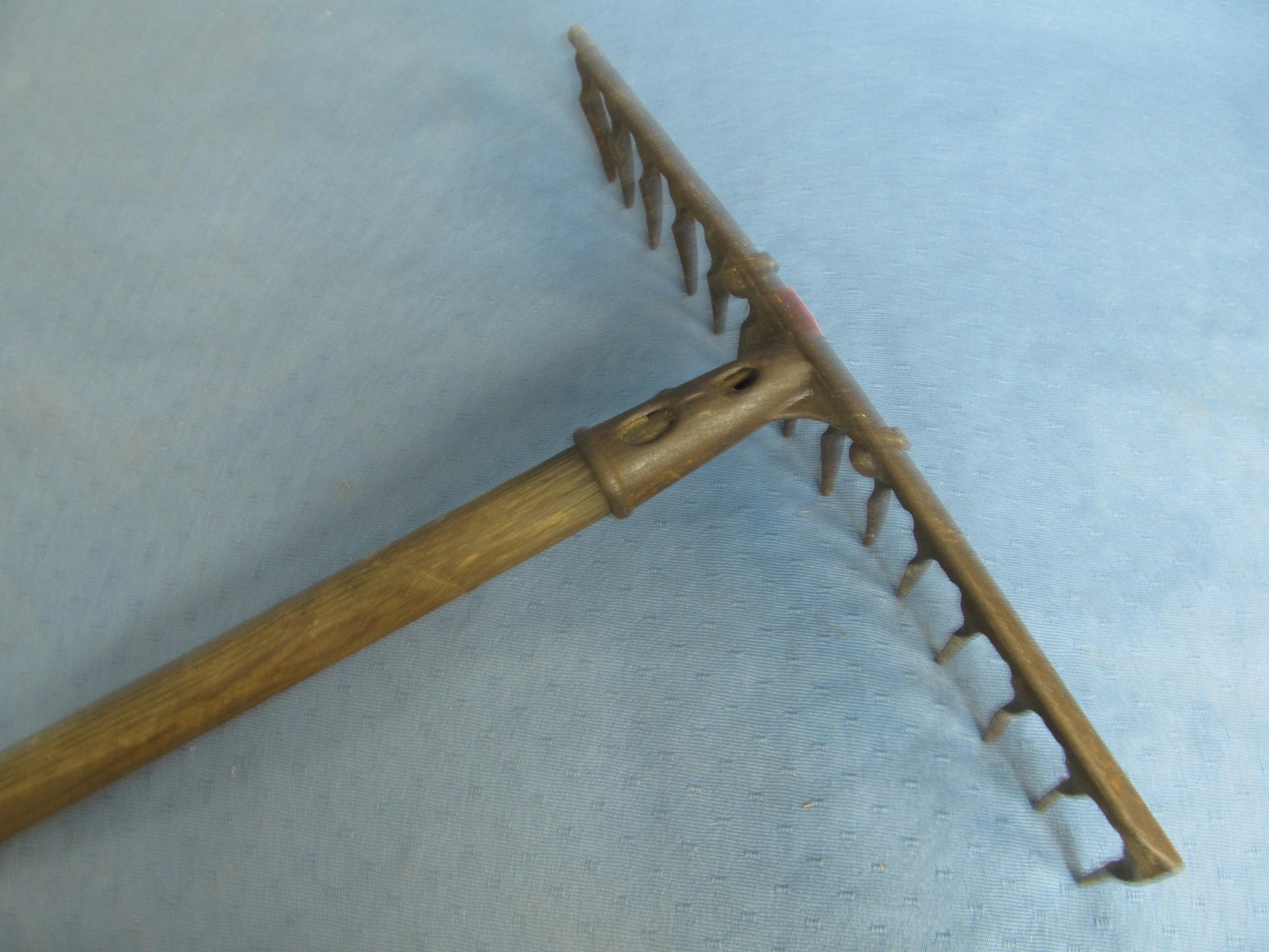 Vintage Iron Rake – 47 1/2” Tall (nicely worn wooden handle) w/ 13 1/2” W Iron rake Head