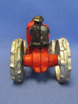 Painted Cast Iron Model of Farmer Driving Tractor – 5 1/4” long – Newer – Good condition, as shown