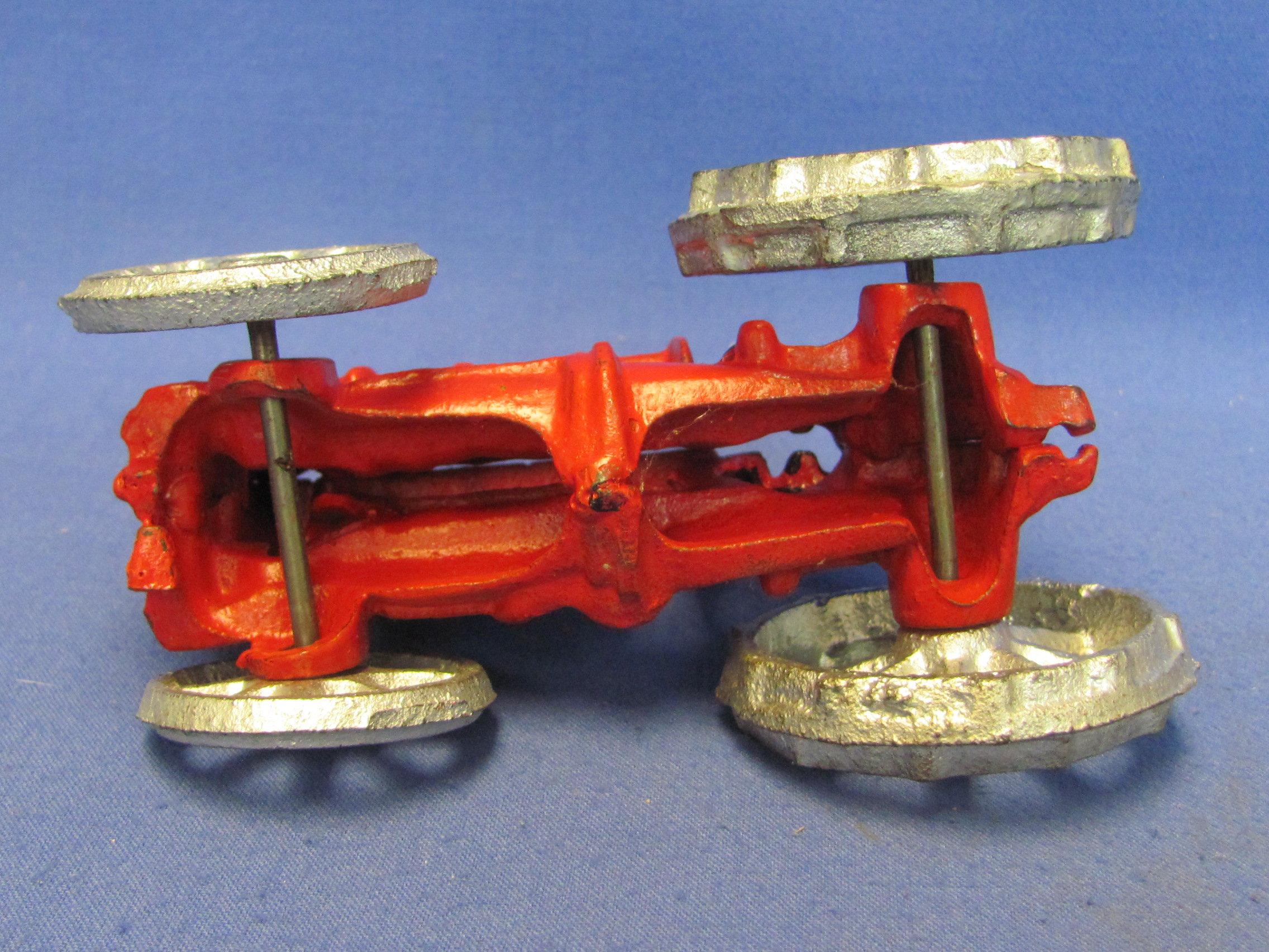 Painted Cast Iron Model of Farmer Driving Tractor – 5 1/4” long – Newer – Good condition, as shown