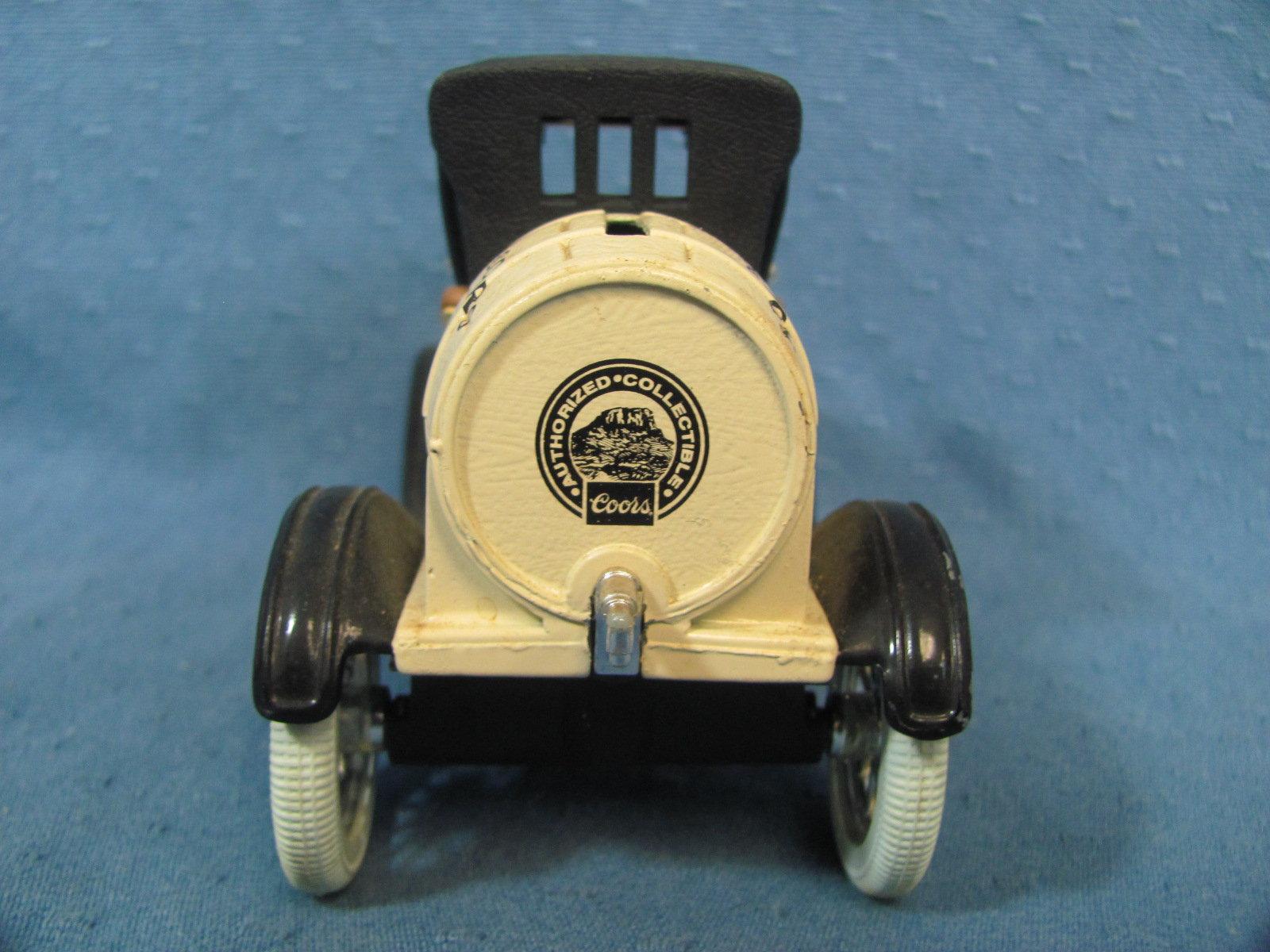 Two Coin Banks – Adolph Coors Company 1918 Ford Model T  - Wells Fargo Stage Coach Bank – 5” long