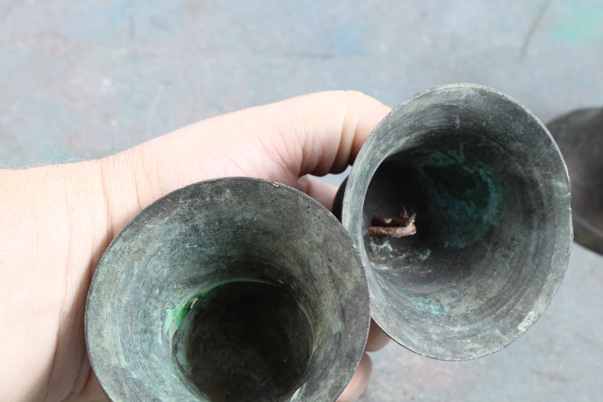 4 Antique Brass Bells - 1 has old leather strap - Bells about 3" tall