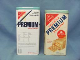 Nabisco Premium Saltine Cracker Tins (2) – 9” & 9 1/2” T – Some Wear/Scratches/Marks/Dents