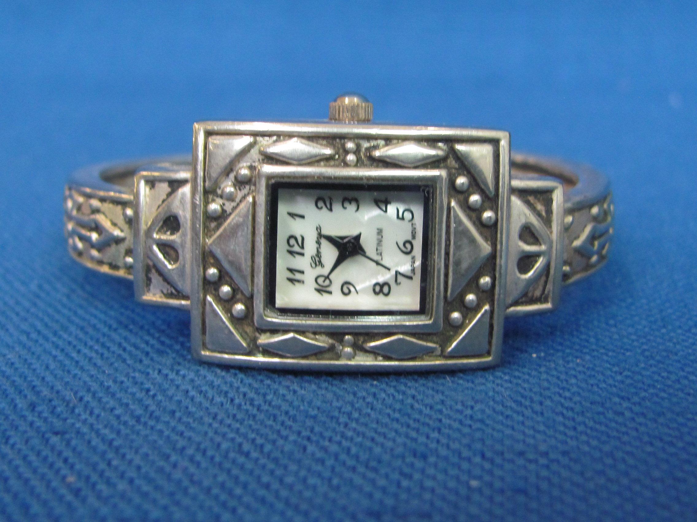 2 Geneva Clamp Bracelet Style Wristwatches – Both running – Silvertone