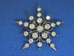 Sterling Silver Snowflake Pin w Cubic Zirconias – 1 5/8” in diameter – Weight is 8.0 grams