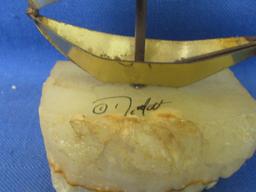 Mid Century Brutalist Brass Sailboat Sculpture on raw edge onyx base. By DeMott Signed, DeMott.