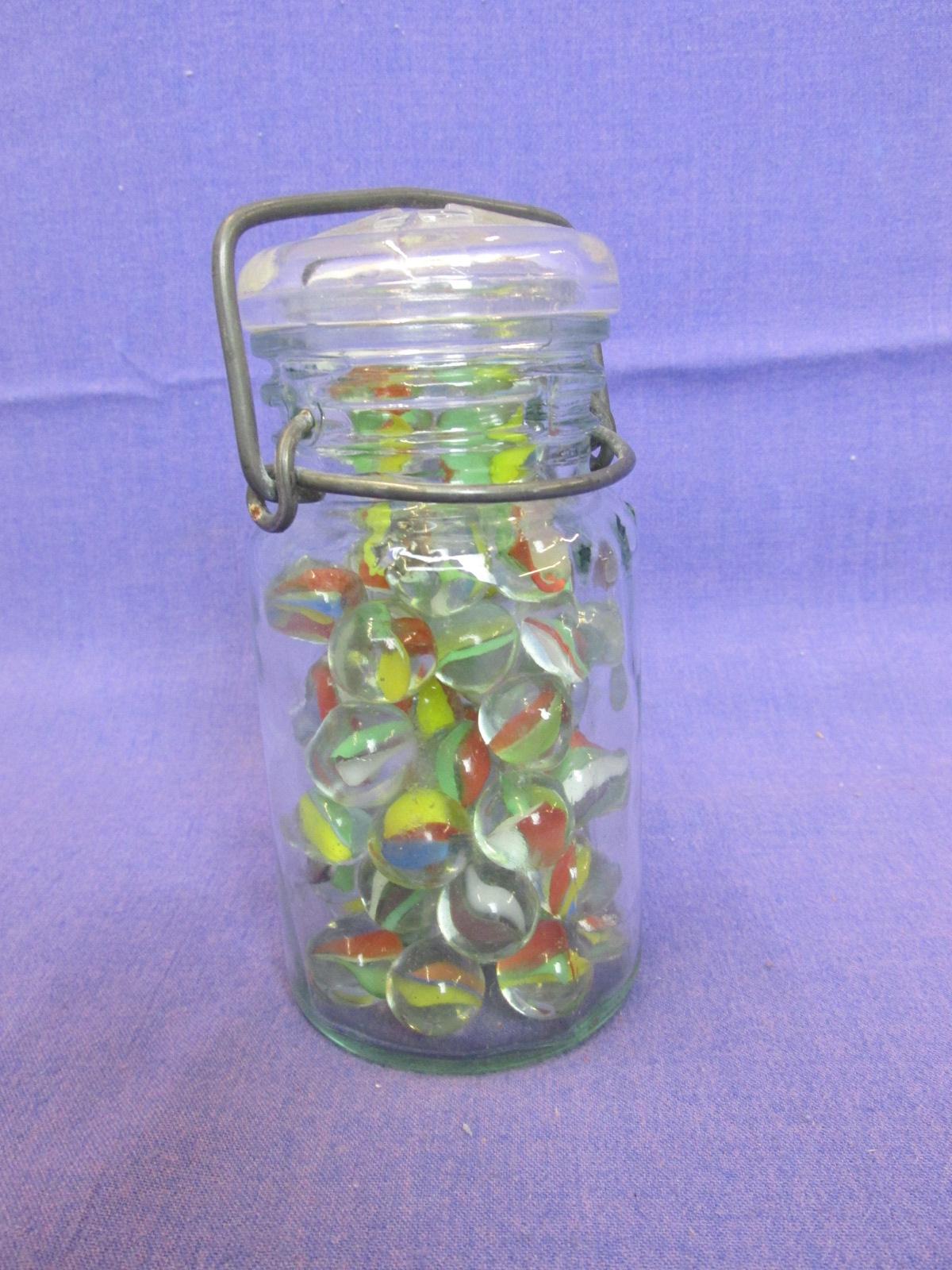 60 Glass Marbles in Glass Jar with Metal Bale – Jar is 5 1/4” tall