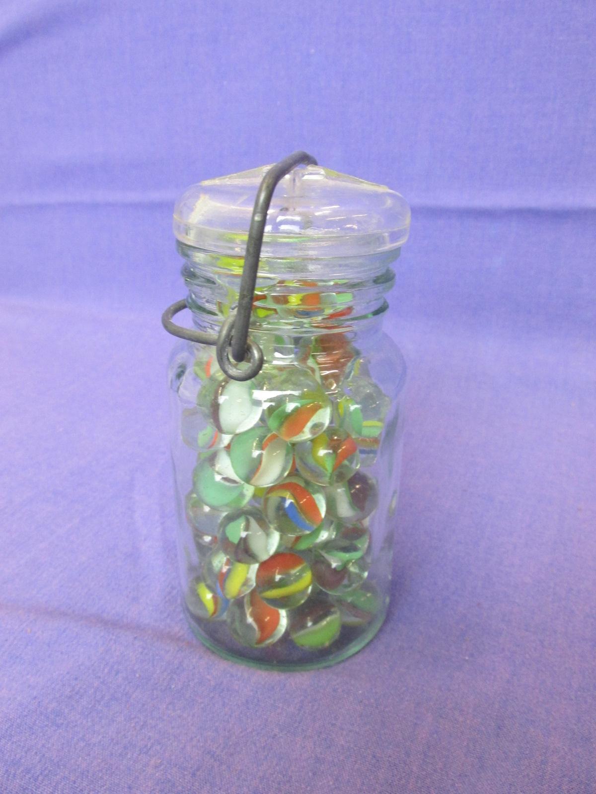 60 Glass Marbles in Glass Jar with Metal Bale – Jar is 5 1/4” tall