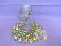 60 Glass Marbles in Glass Jar with Metal Bale – Jar is 5 1/4” tall