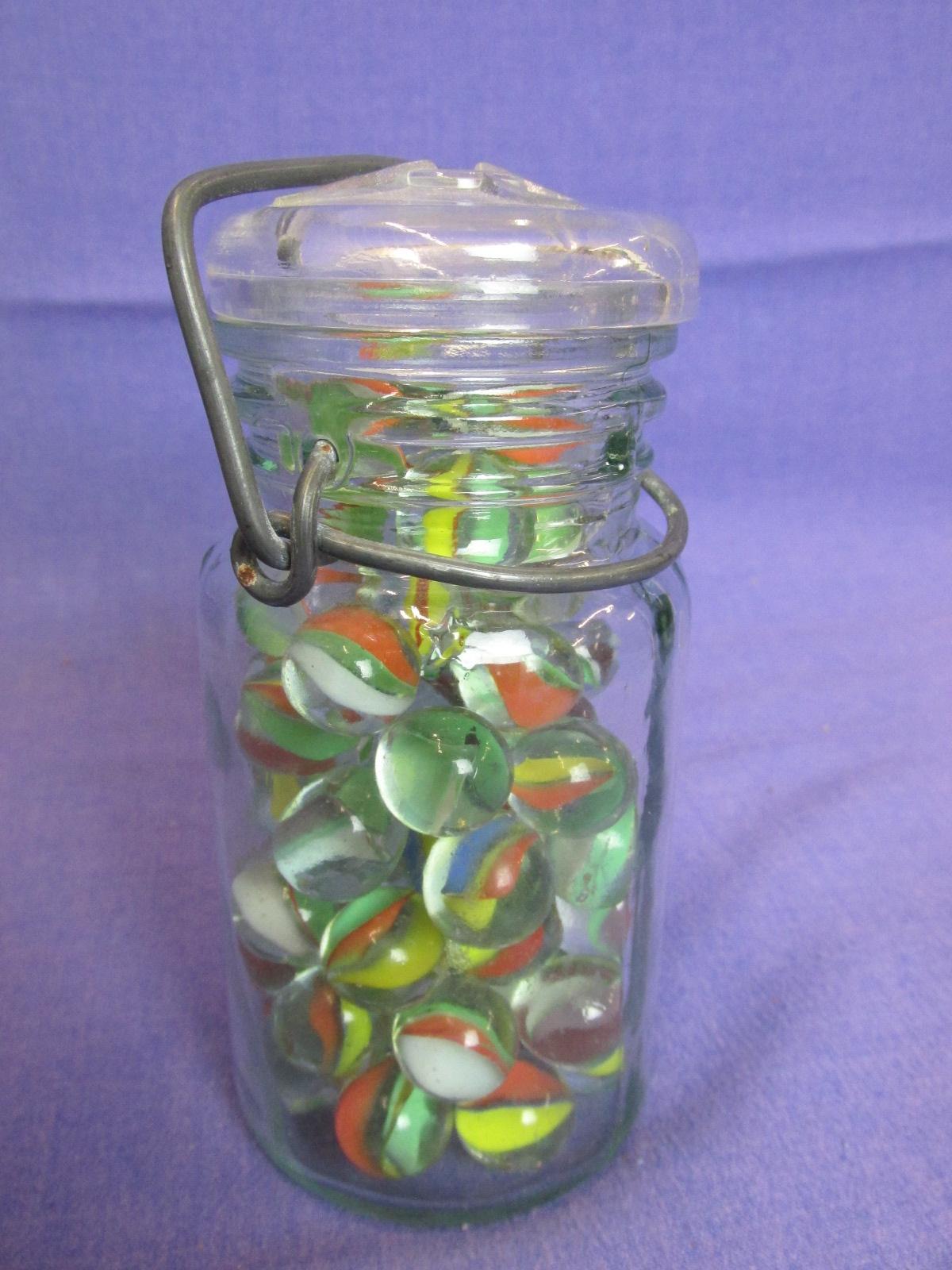 60 Glass Marbles in Glass Jar with Metal Bale – Jar is 5 1/4” tall