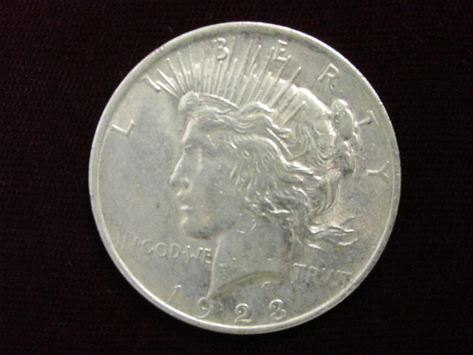 1923 Peace Dollar – As shown – 26.7 grams