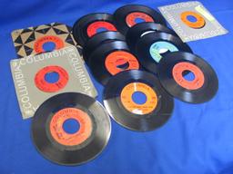 12 Johnny Cash 45 RPM Records – 3 have Jackets