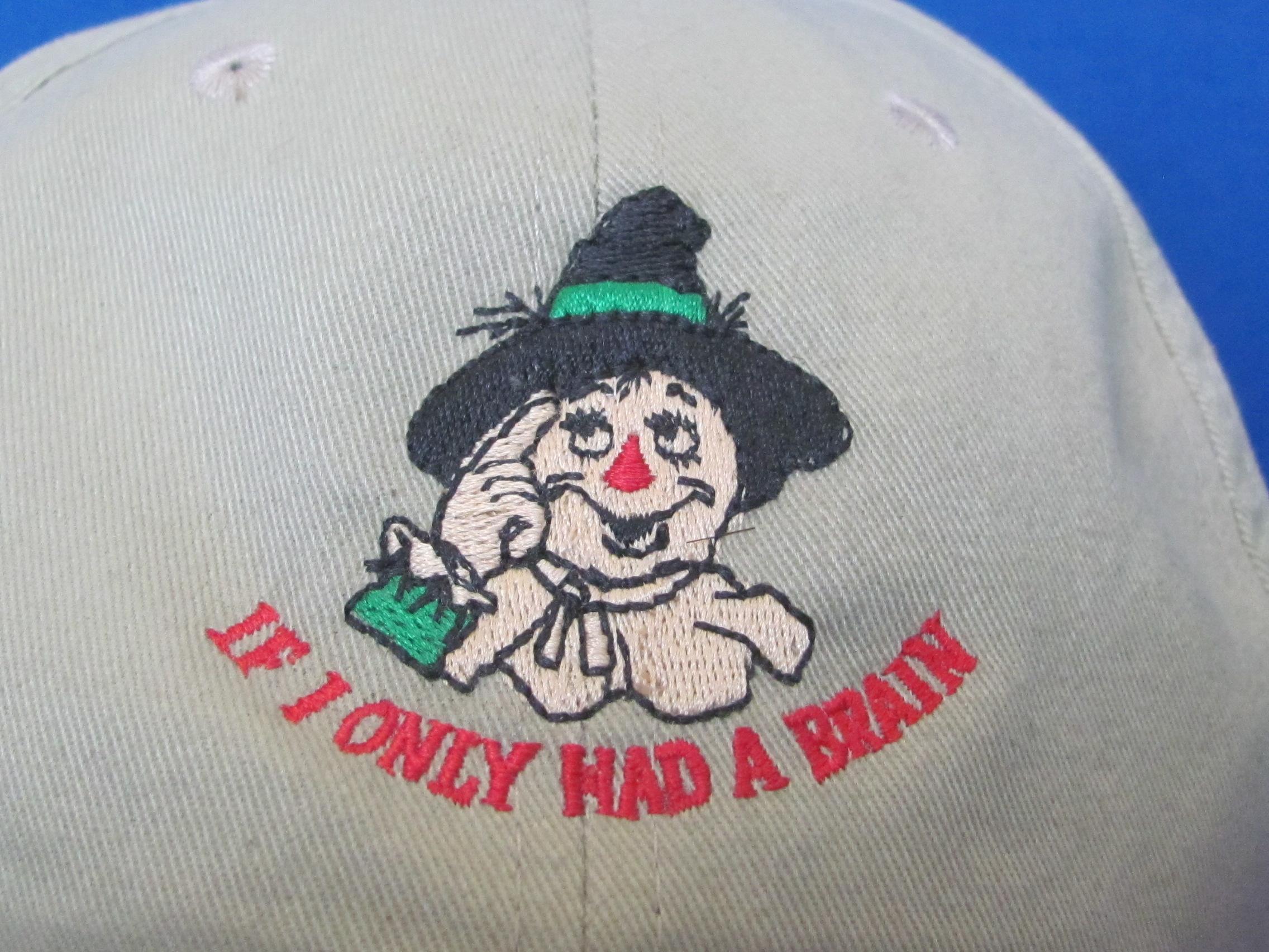 2 Caps: “If I only had a brain” & “A Grouchy German is a Sour Kraut” - Good condition