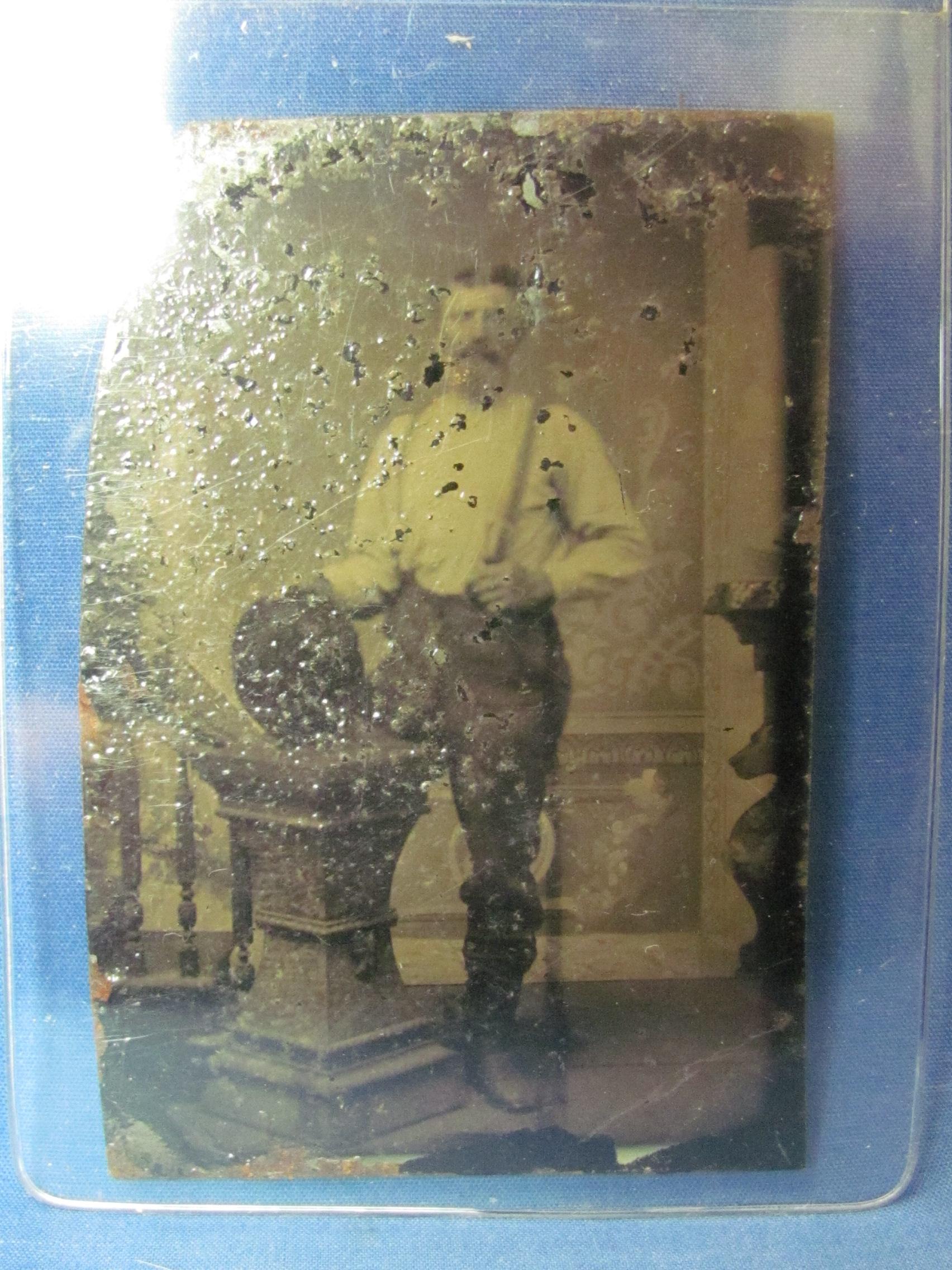 7 Tin Type Photographs – 2 in Brown Case – About 3 1/2” long – Condition varies – As shown