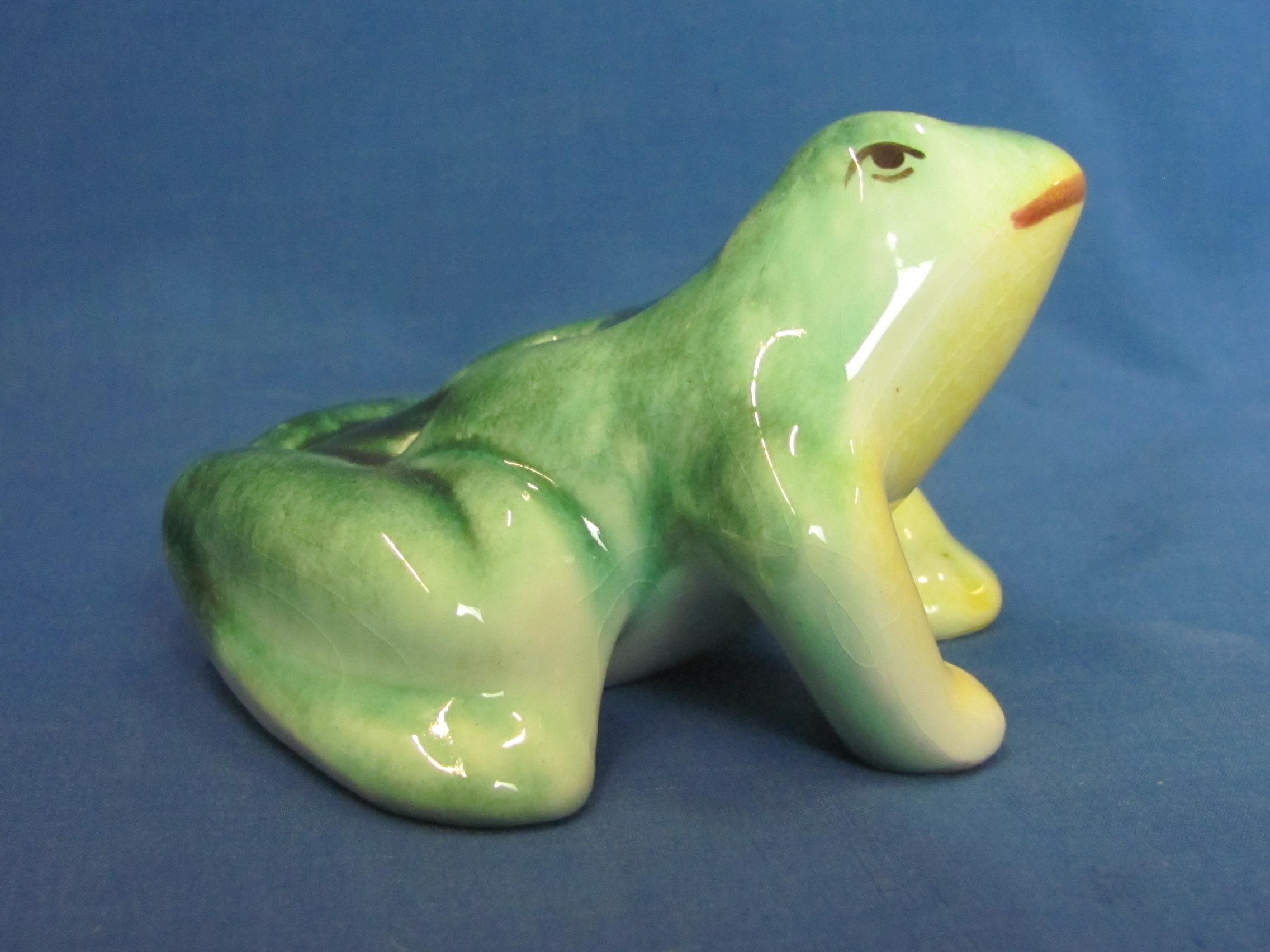 Pottery Frog which is a Flower Frog – Green & Yellow – About 4” long – No chips but some crazing