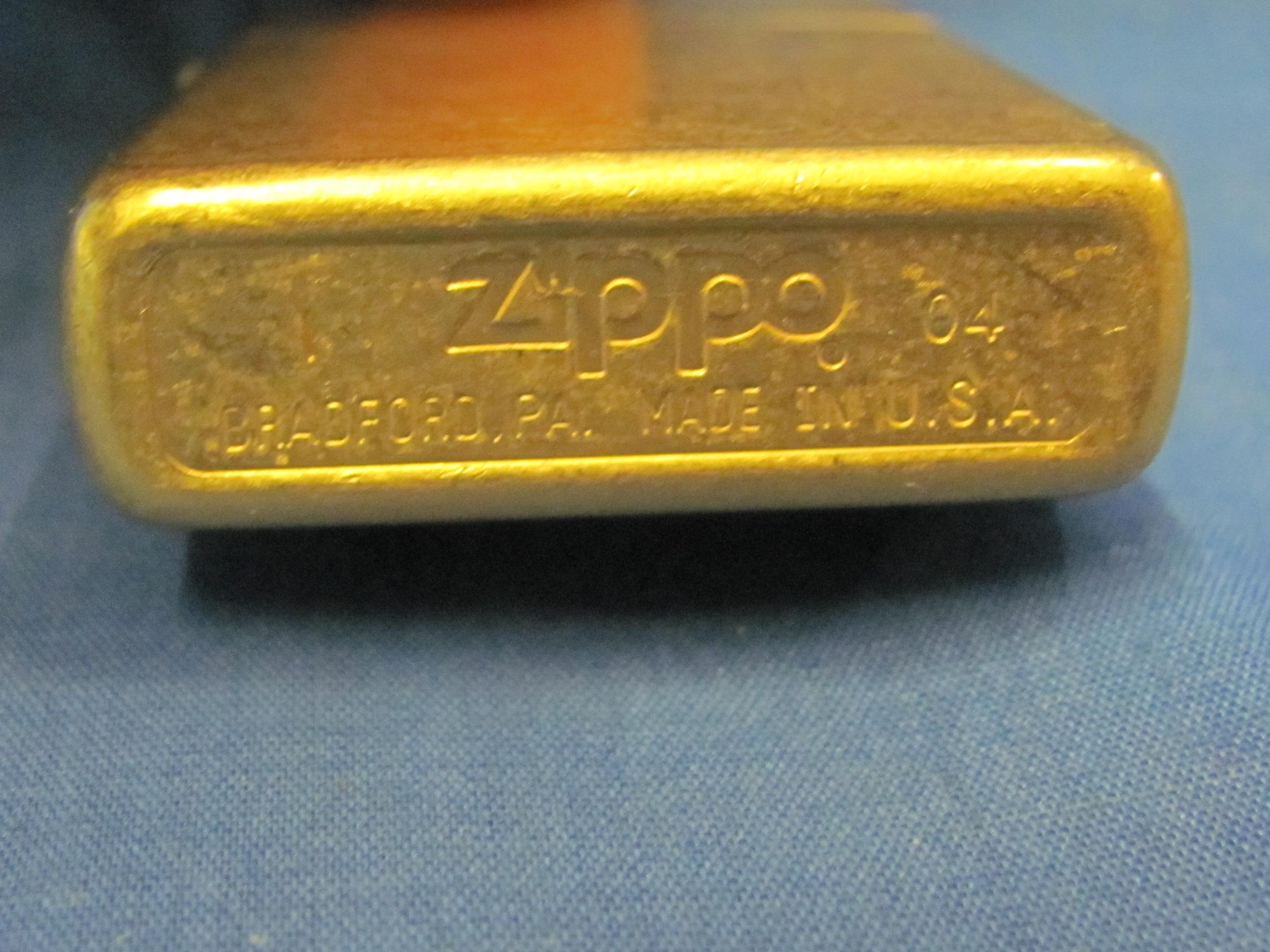 Brass & Gold Tone Zippo Lighters (2) – 1995 & 2004 – Both Spark – As Shown