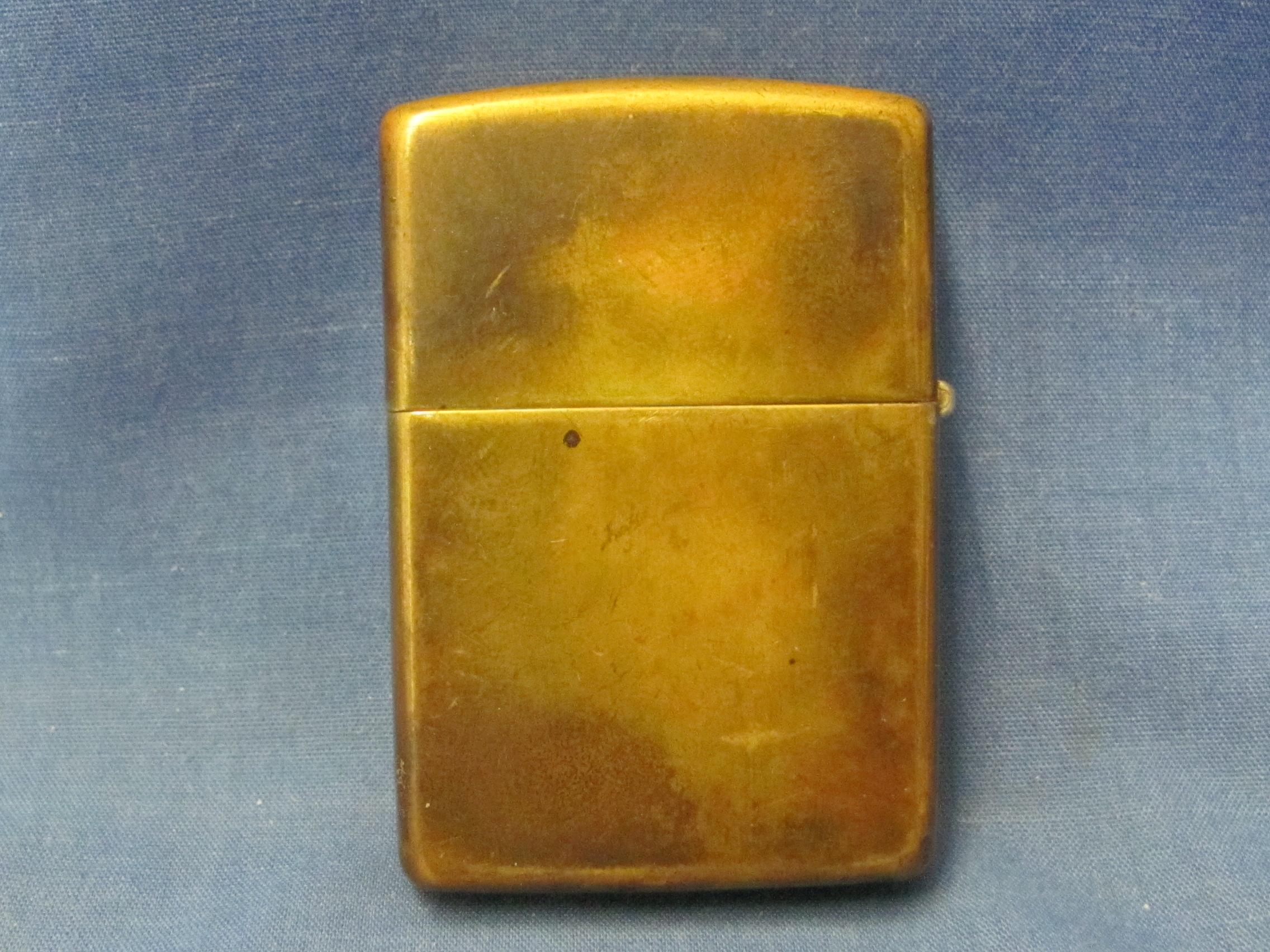 Brass & Gold Tone Zippo Lighters (2) – 1995 & 2004 – Both Spark – As Shown