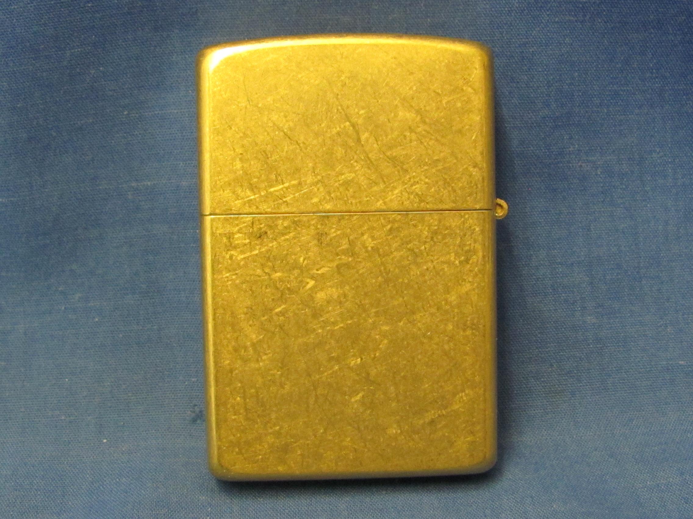 Brass & Gold Tone Zippo Lighters (2) – 1995 & 2004 – Both Spark – As Shown