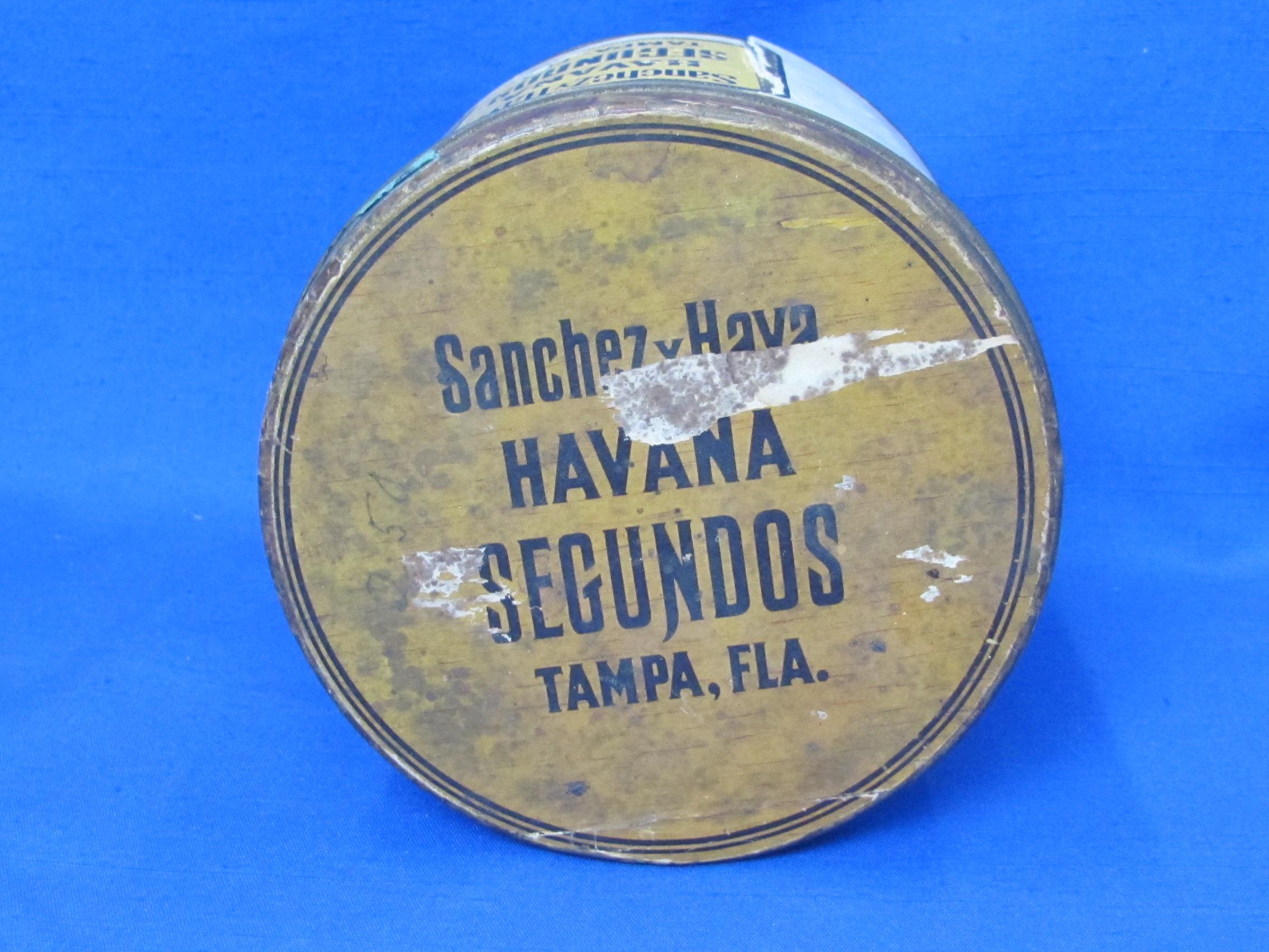 Round Cigar Tin with Paper Label “Sanchez & Haya Co. Tampa, Fla.”  4 3/4” tall – 5 1/4” in diameter