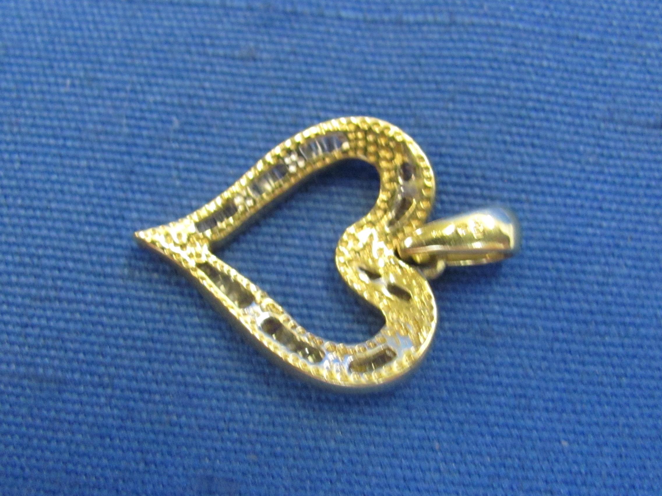 10 Kt Gold Heart Pendant with Channel Set Baguettes – 1 1/8” long – Weight is 3.3 grams