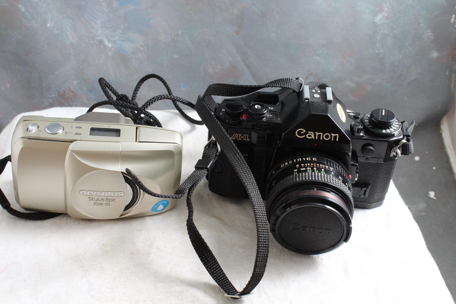 2 Vintage Cameras CANON A-1 SLR with 50mm Canon Lens & Olympus Stylus