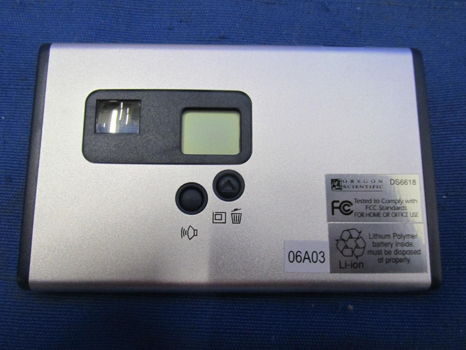 Oregon Scientific DS6618 0.3MP Digital Camera – size of a Credit Card Calculator
