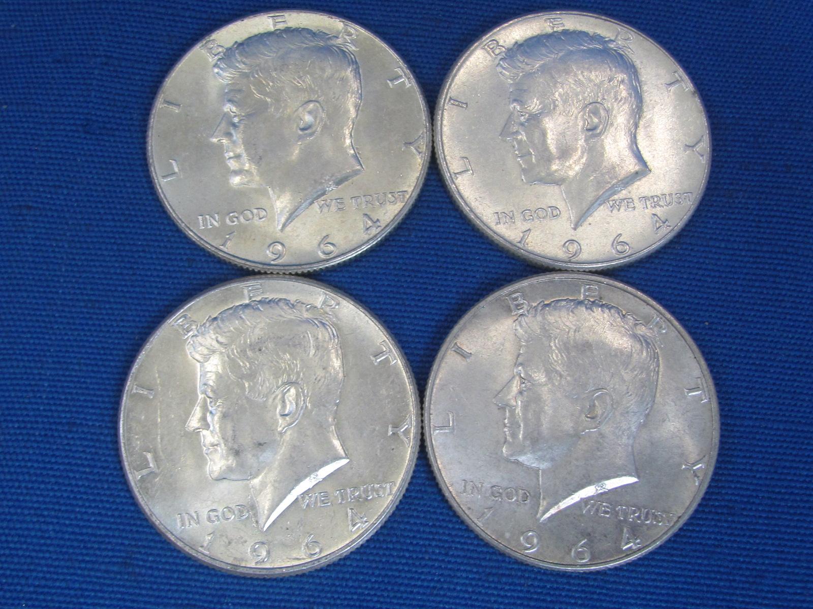 4 1964 Kennedy Half Dollars