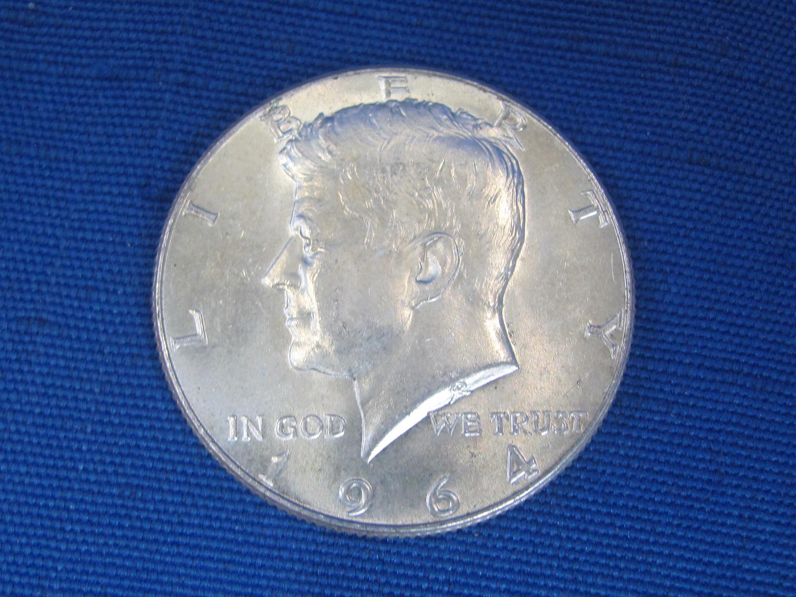 4 1964 Kennedy Half Dollars