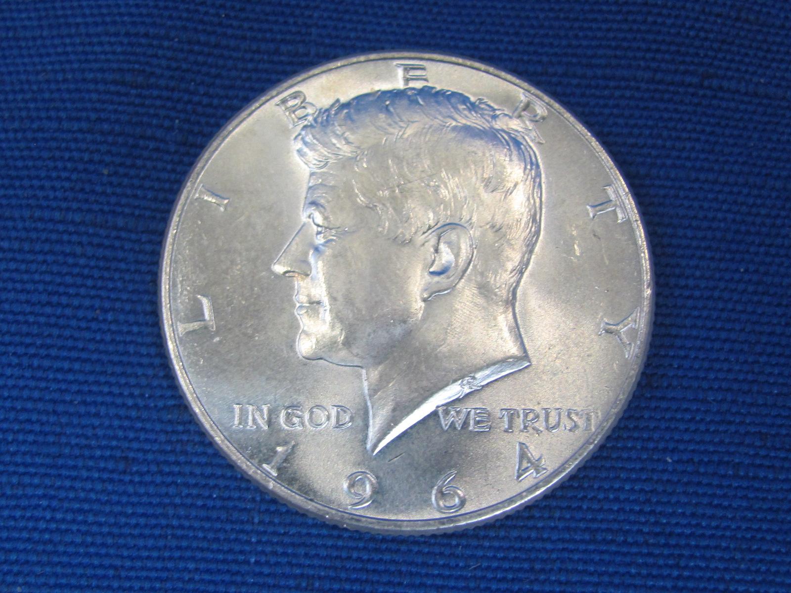 4 1964 Kennedy Half Dollars