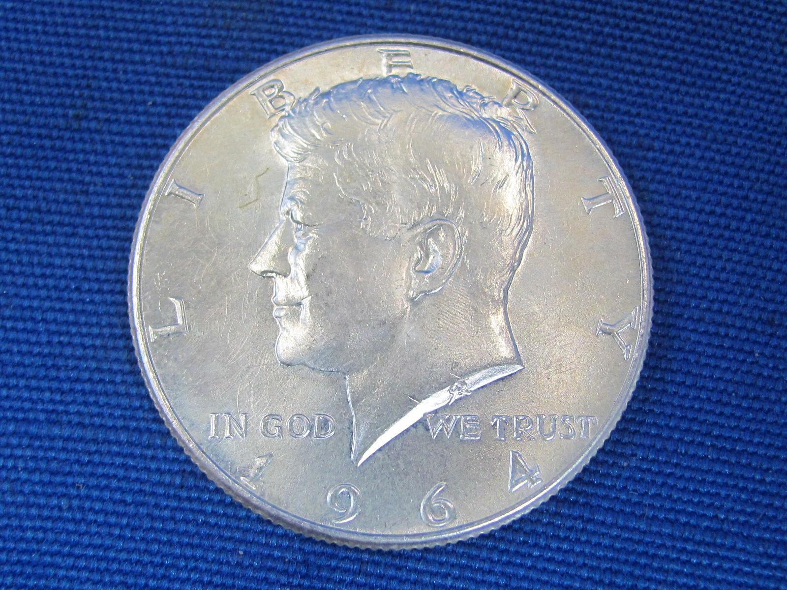 4 1964 Kennedy Half Dollars