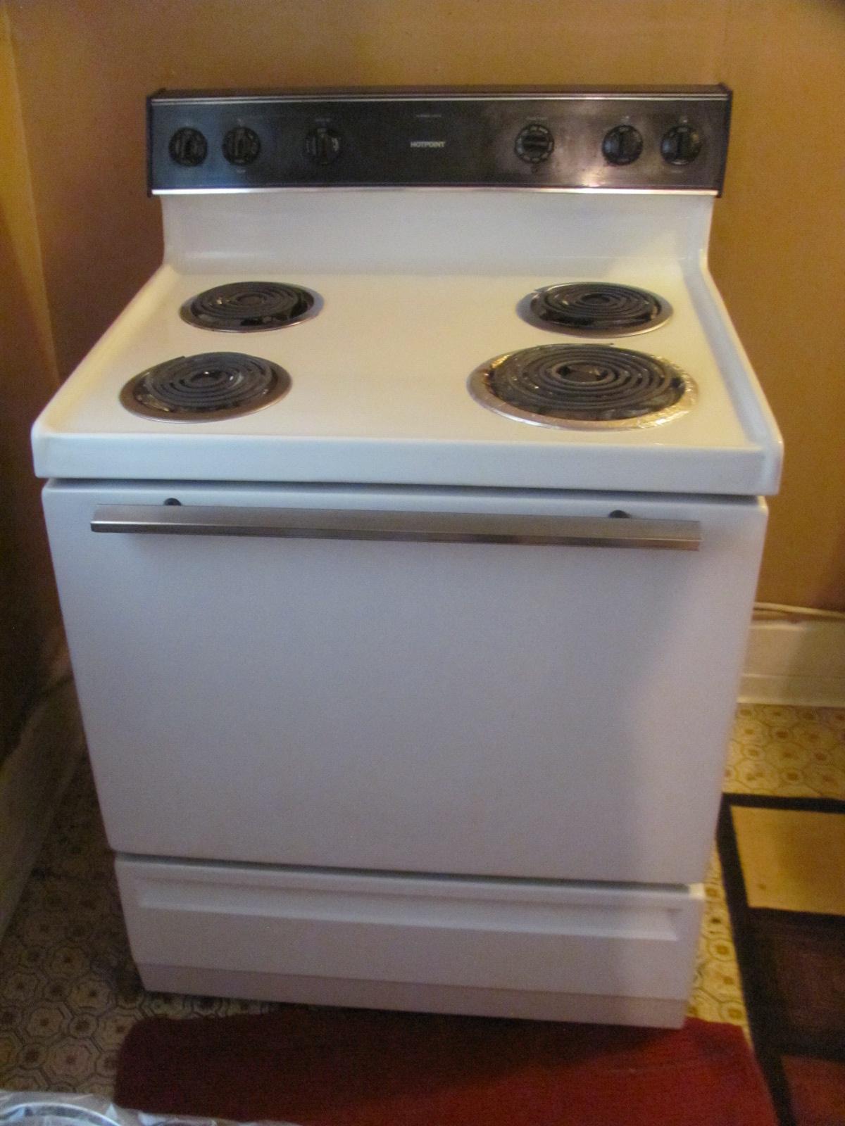 Hot Point Electric Stove White/Black 29 1/2” W x 24 1/2” D older but functioning