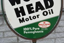 We Sell Wolf's Head Motor Oil Metal Sign