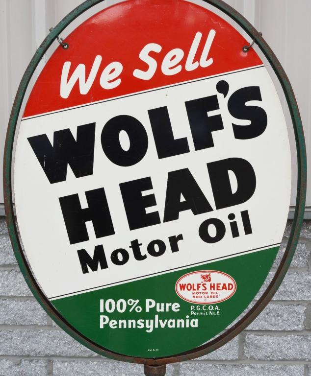 We Sell Wolf's Head Motor Oil Metal Sign