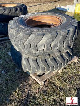 (2)  15.5-25 loader tires and rims