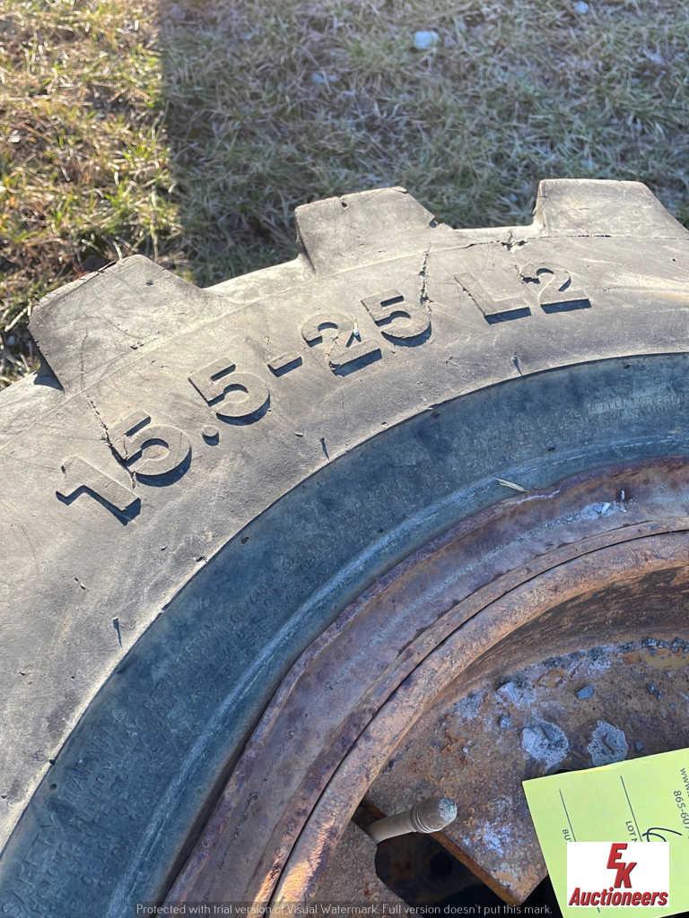 (2)  15.5-25 loader tires and rims