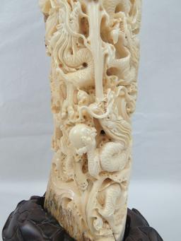 A carved and pierced vertical segment of Woolly Mammoth tusk decorated in the Oriental style