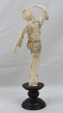 A delightful carved and polished Woolly Mammoth tusk segment in the form of a European dancing lady
