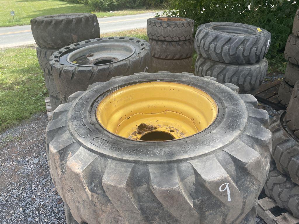 12-16.5 TIRES AND WHEELS ON NEW HOLLAND WHEELS