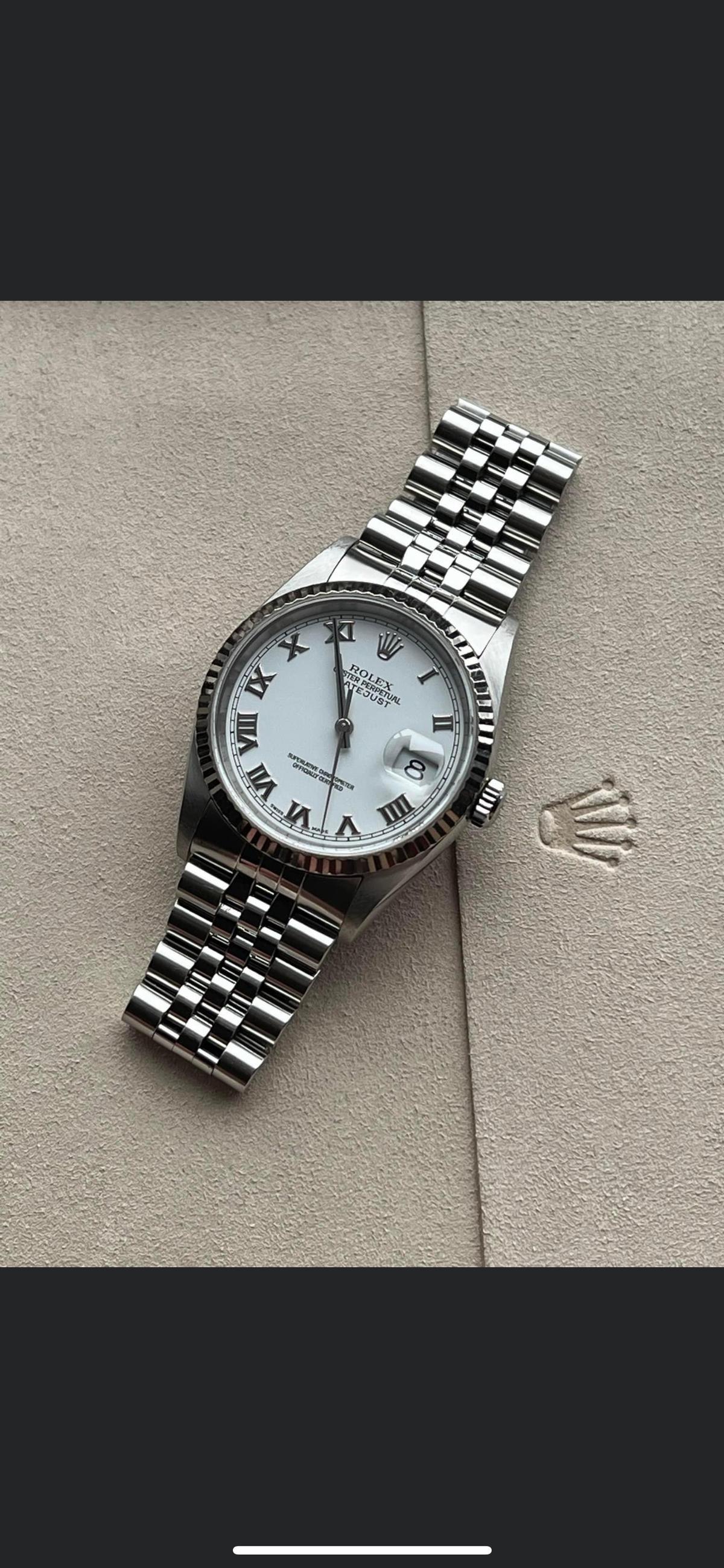 USED 36 MM ROMAN NUMERAL ROLEX DATEJUST IN EXCELLENT CONDITION COMES WITH BOX & APPRAISAL