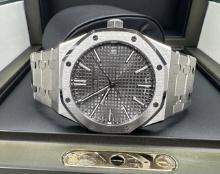 AUDEMARS PIGUET 39MM BLACK DIAL 15300ST COMES WITH BOX AND PAPERS