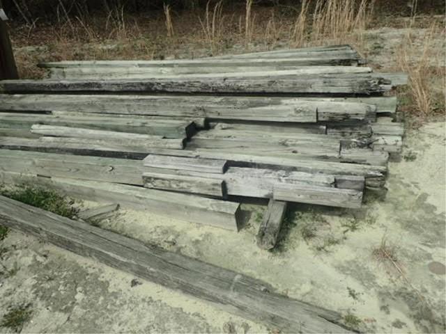Stack of  Miscellaneous Wood Post